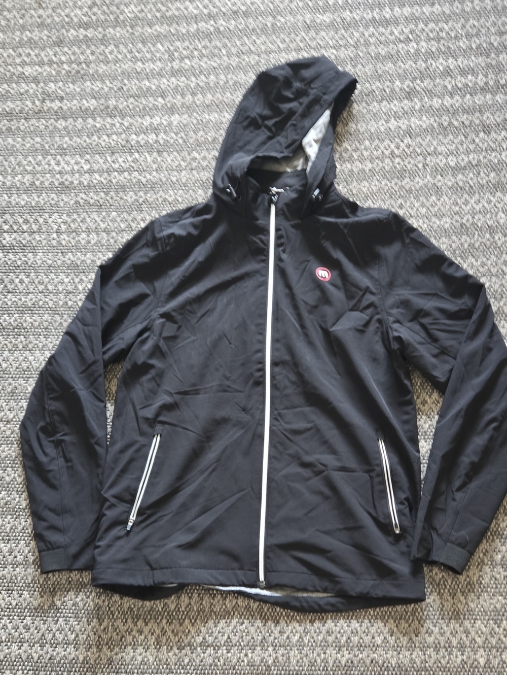Travis Mathew Black Hooded Windbreaker with White Zippers